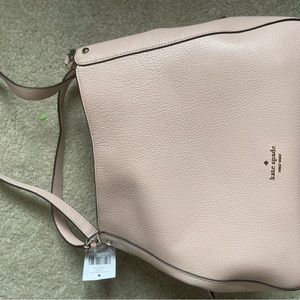 Kate Spade Leila pebbled leather medium in Rose Smoke colored